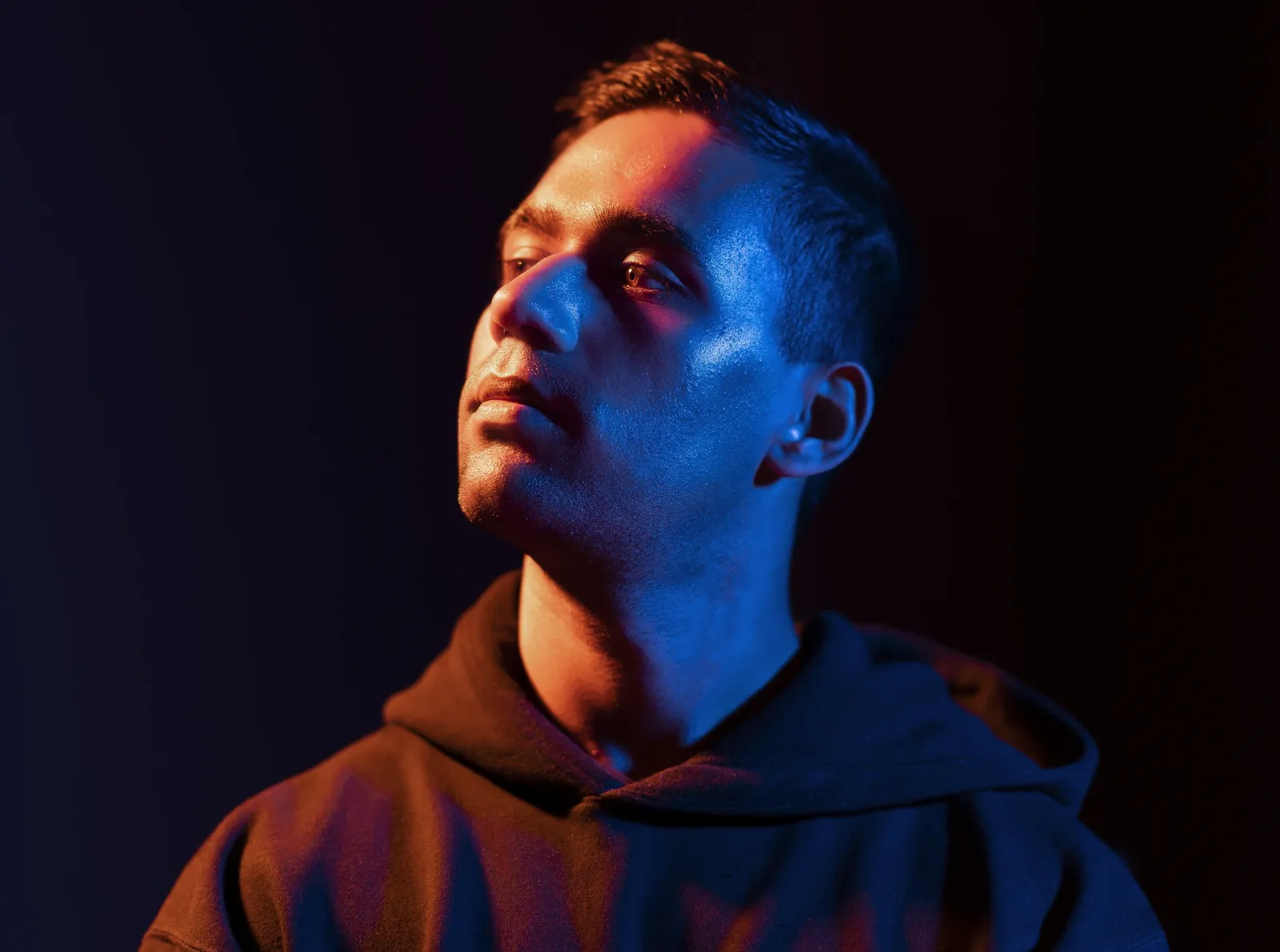 Khush Patel — neon-lit portrait